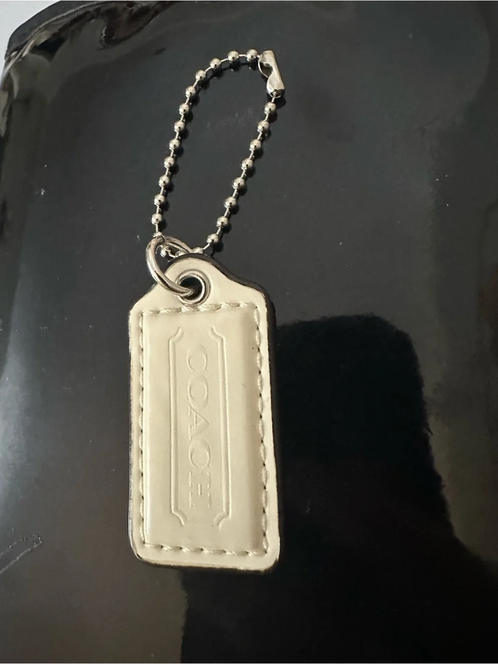 COACH Leather Hangtag | Bag Charm in Cream with Embossed Logo
